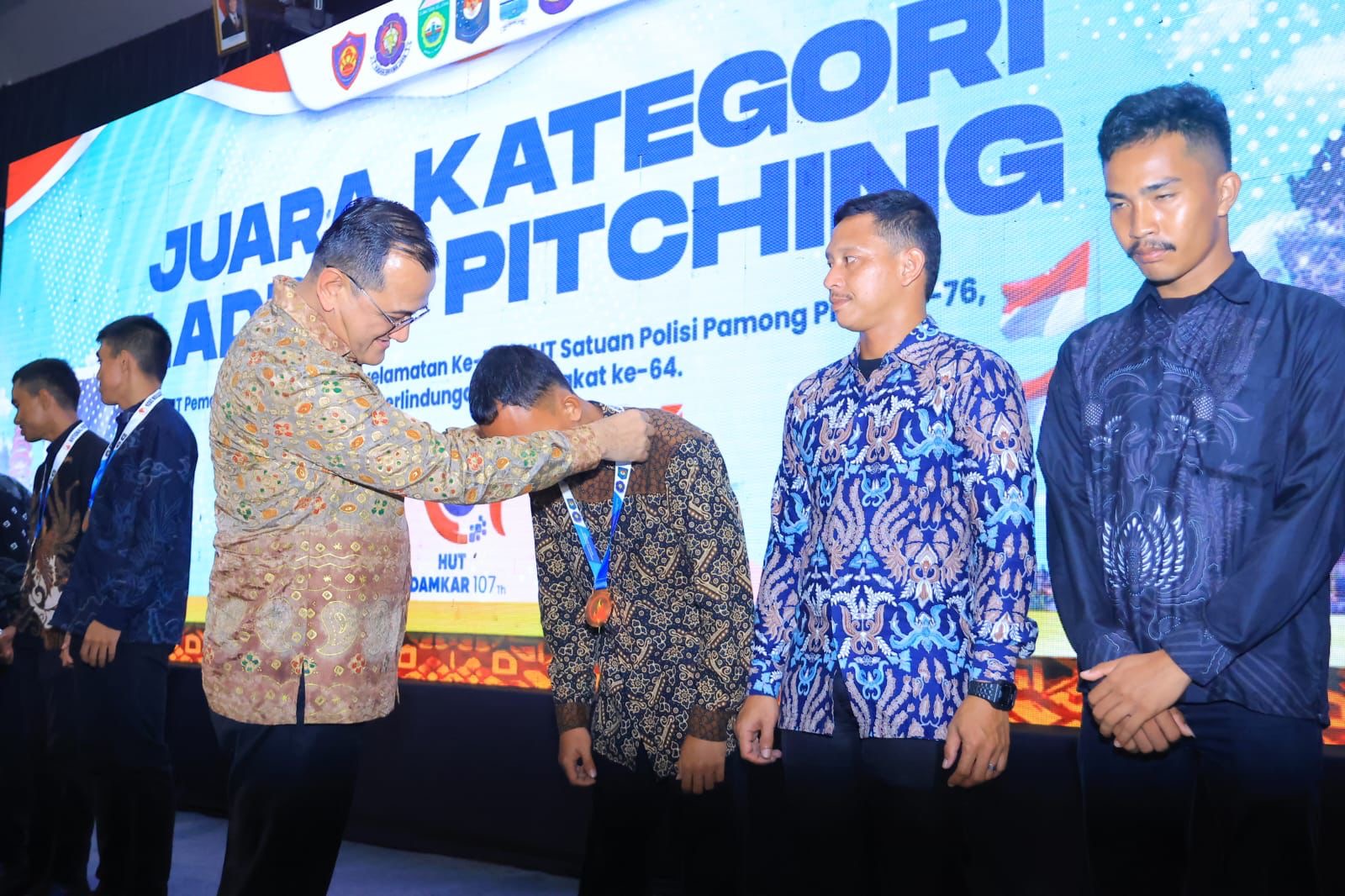 Sekda Sumsel Hadiri Gala Dinner Peringatan HUT Damkar, Satpol PP, dan Satlinmas di JSC Palembang